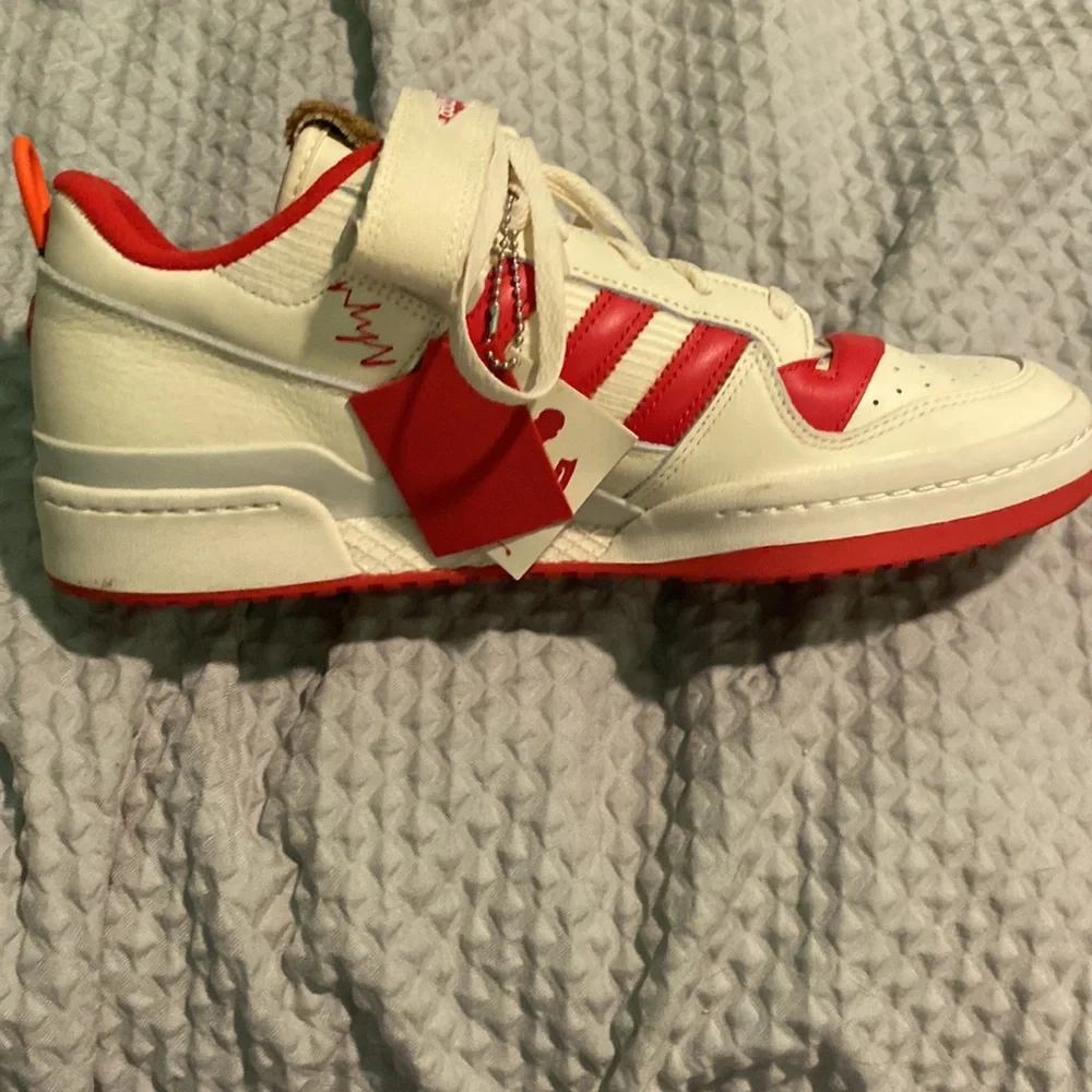 a pair of NMD ADDIDAS exclusive home alone collab - Picture 2 of 4